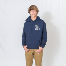 Load image into Gallery viewer, Heather Navy Hooded Sweatshirt with Be the Light Design on Left Chest
