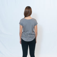 Load image into Gallery viewer, Rear View Nickel Gray Wide Neck T-shirt with Ari&#39;s Heart in Red on Left Shoulder
