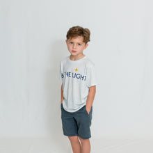 Load image into Gallery viewer, White Heather Youth Size T-Shirt with Be the Light Design in Blue Across the Chest
