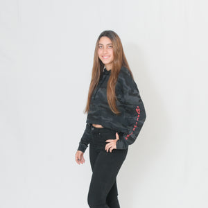 Stylish black camo print cropped hoodie with Be the Light written in red on the sleeve