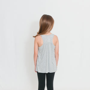 Rear view Girls Flowy Racerback Tank Top in light heather gray with Ari's Heart in red on left chest