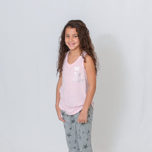 Girls pale pink v-neck sleeveless flowy racerback tank. BE THE LIGHT on the left chest in silver.