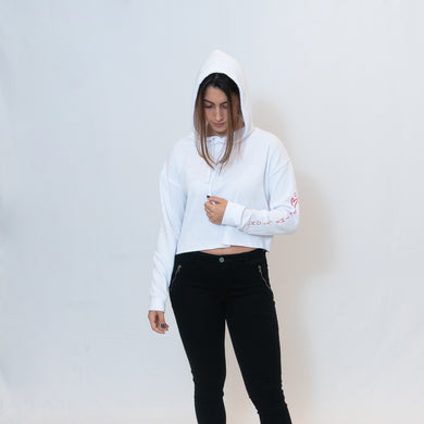 Simple white cropped hoodie with Be the Light written in red on the sleeve