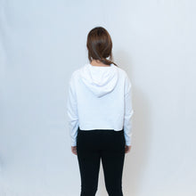 Load image into Gallery viewer, Rear view of white cropped hoodie with Be the Light written on the sleeve

