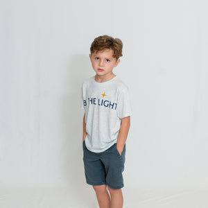 White Heather Youth Size T-Shirt with Be the Light Design in Blue Across the Chest