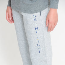 Load image into Gallery viewer, Gray Youth Fleece Joggers with Pockets and Be the Light Design on Left Thigh
